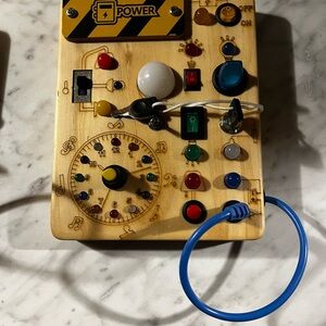 Wooden Interactive Toy with Colorful Buttons